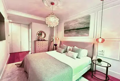 Ein Bett oder Betten in einem Zimmer der Unterkunft Moderne 4-Zimmer-Wohnung