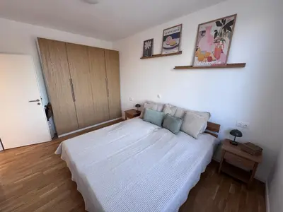 Ein Bett oder Betten in einem Zimmer der Unterkunft Ferienzentrum Neubrück '3 Zimmer Apartment mit Seeblick'