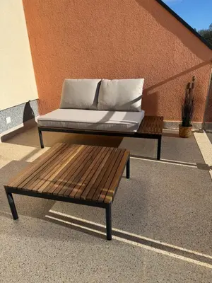 Ein Sitzbereich in der Unterkunft Ferienzentrum Neubrück '3 Zimmer Apartment mit Seeblick'