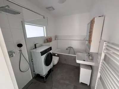 Ein Badezimmer in der Unterkunft Ferienzentrum Neubrück '3 Zimmer Apartment mit Seeblick'