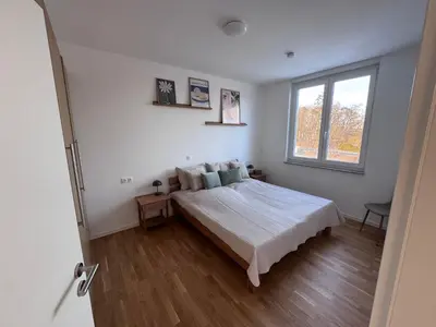 Ein Bett oder Betten in einem Zimmer der Unterkunft Ferienzentrum Neubrück '3 Zimmer Apartment mit Seeblick'