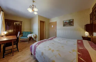 Ein Bett oder Betten in einem Zimmer der Unterkunft Hotel & Restaurant Landhaus Hönow