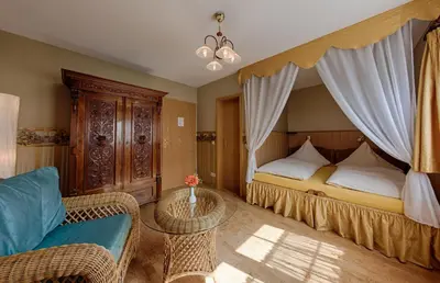Ein Bett oder Betten in einem Zimmer der Unterkunft Hotel & Restaurant Landhaus Hönow