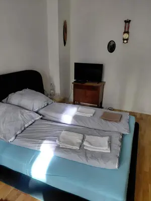 Ein Bett oder Betten in einem Zimmer der Unterkunft Berlin beautiful center Room