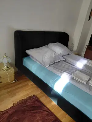 Ein Bett oder Betten in einem Zimmer der Unterkunft Berlin beautiful center Room