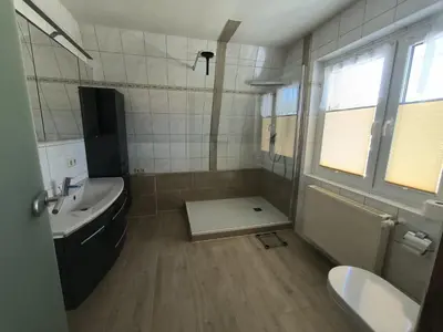 Ein Badezimmer in der Unterkunft Leuchtturmhus