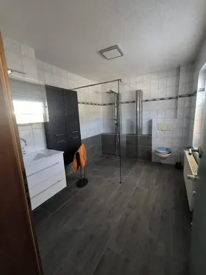 Ein Badezimmer in der Unterkunft Leuchtturmhus