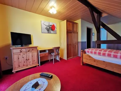 Ein Bett oder Betten in einem Zimmer der Unterkunft Pension zum Wiesengrund - Doppelzimmer