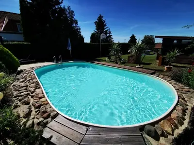 Der Swimmingpool an oder in der Nähe von Pension zum Wiesengrund - Ferienwohnung