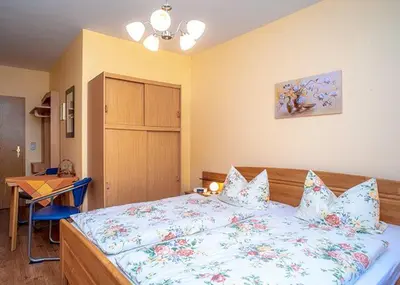 Ein Bett oder Betten in einem Zimmer der Unterkunft Spreewald-Pension Marina