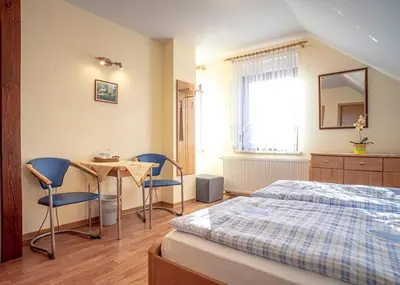 Ein Bett oder Betten in einem Zimmer der Unterkunft Spreewald-Pension Marina