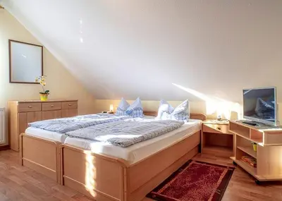 Ein Bett oder Betten in einem Zimmer der Unterkunft Spreewald-Pension Marina