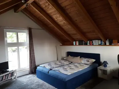 Ein Bett oder Betten in einem Zimmer der Unterkunft Ferienhaus 1938