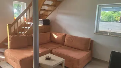 Ein Sitzbereich in der Unterkunft Ferienhaus 1938