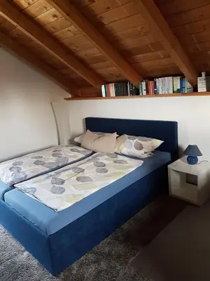 Ein Bett oder Betten in einem Zimmer der Unterkunft Ferienhaus 1938