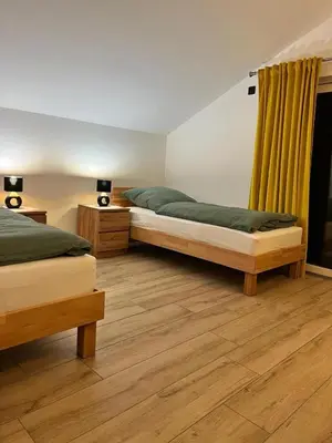 Ein Bett oder Betten in einem Zimmer der Unterkunft Ferien-monteurwohnung