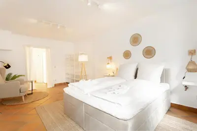 Ein Bett oder Betten in einem Zimmer der Unterkunft gemütliches, helles Apartment mit offener Küche