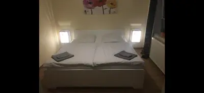 Ein Bett oder Betten in einem Zimmer der Unterkunft Pension am Markt Luckenwalde