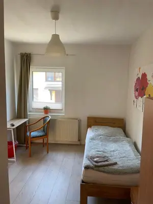 Ein Bett oder Betten in einem Zimmer der Unterkunft Pension am Markt Luckenwalde