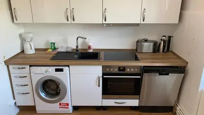 Küche/Küchenzeile in der Unterkunft Möblierte Wohnung in Fürstenwalde für bis zu 8 Personen