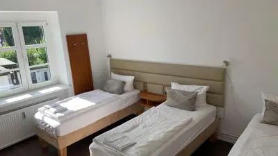 Ein Bett oder Betten in einem Zimmer der Unterkunft Möblierte Wohnung in Fürstenwalde für bis zu 8 Personen