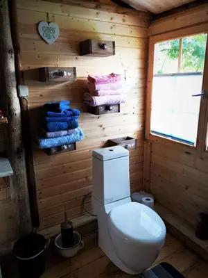 Ein Badezimmer in der Unterkunft Holzhaus