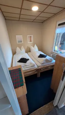 Ein Bett oder Betten in einem Zimmer der Unterkunft Ferienhaus mit großer Terrasse in Schöneiche bei Berlin