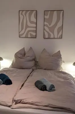 Ein Bett oder Betten in einem Zimmer der Unterkunft Großzügiges Familien-Apartment im Herzen Lübbens