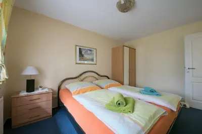 Ein Bett oder Betten in einem Zimmer der Unterkunft Feriendomizil Hönow
