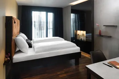 Ein Bett oder Betten in einem Zimmer der Unterkunft Hotel ZOE by AMANO