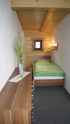 Ein Bett oder Betten in einem Zimmer der Unterkunft Holiday home in Friedland 2712