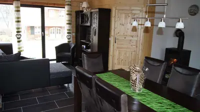 Ein Sitzbereich in der Unterkunft Holiday home in Friedland 2712