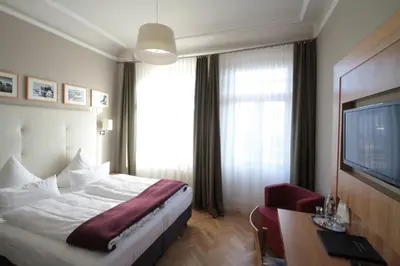 Ein Bett oder Betten in einem Zimmer der Unterkunft Hotel am Molkenmarkt
