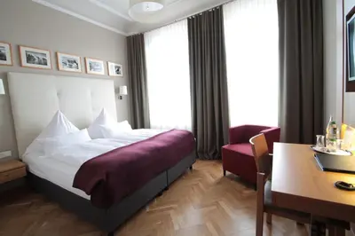 Ein Bett oder Betten in einem Zimmer der Unterkunft Hotel am Molkenmarkt