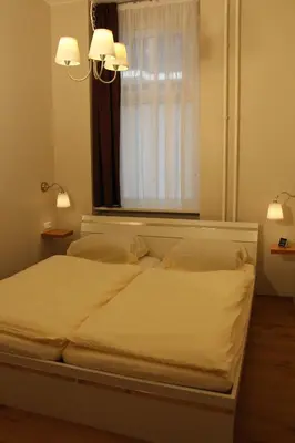 Ein Bett oder Betten in einem Zimmer der Unterkunft Stars Berlin Apartments Zillestraße