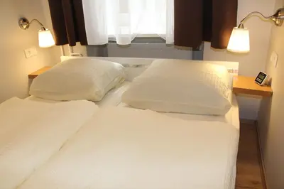 Ein Bett oder Betten in einem Zimmer der Unterkunft Stars Berlin Apartments Zillestraße