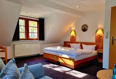 Ein Bett oder Betten in einem Zimmer der Unterkunft Fritz Aparthotel Potsdam