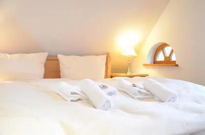 Ein Bett oder Betten in einem Zimmer der Unterkunft Fritz Aparthotel Potsdam