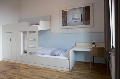 Ein Bett oder Betten in einem Zimmer der Unterkunft Jugendherberge Berlin Ostkreuz