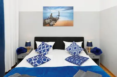 Ein Bett oder Betten in einem Zimmer der Unterkunft Grand Central Mitte Apartment