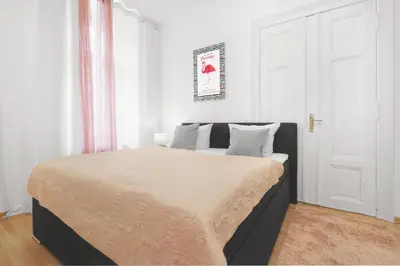 Ein Bett oder Betten in einem Zimmer der Unterkunft Grand Central Mitte Apartment