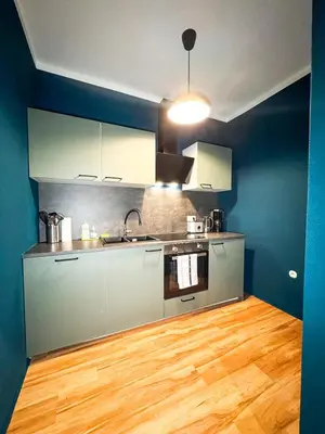 Küche/Küchenzeile in der Unterkunft primeflats - Apartments Genter Berlin-Wedding
