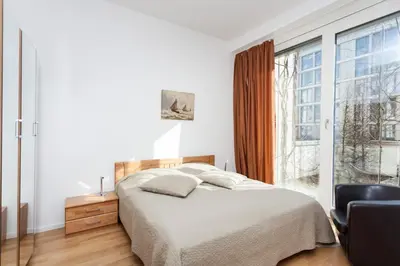 Ein Bett oder Betten in einem Zimmer der Unterkunft Modern Apartment in the Luxury Complex Marthashof