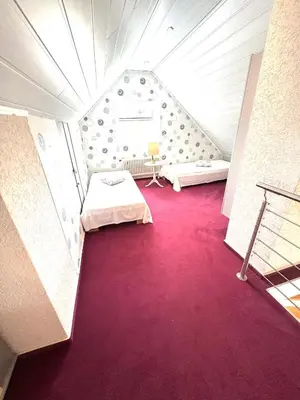 Ein Bett oder Betten in einem Zimmer der Unterkunft Fewo Am Krongut Bornstedt