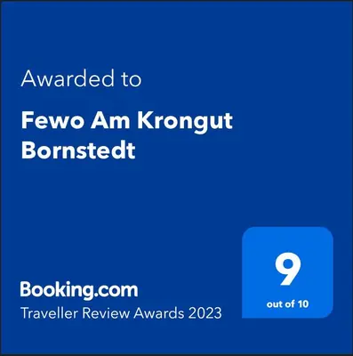 Ein Zertifikat, Auszeichnung, Logo oder anderes Dokument, das in der Unterkunft Fewo Am Krongut Bornstedt ausgestellt ist