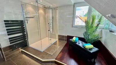 Ein Badezimmer in der Unterkunft Fewo Am Krongut Bornstedt
