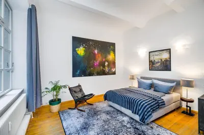 Ein Bett oder Betten in einem Zimmer der Unterkunft The Melchior, Luxury Industry Loft in Mitte, group & family friendly, 2 bath rooms, big dining table, ideal for 4 - 6 Guests
