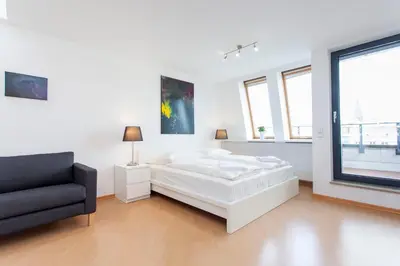 Ein Bett oder Betten in einem Zimmer der Unterkunft The Danziger, 2 unique roof top units in PrenzlauerBerg, group & family friendly, from 2 up to 7 Guests