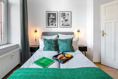 Ein Bett oder Betten in einem Zimmer der Unterkunft TheBödiker Group & Family Apartment, 3 BR, 1 Living room, 2 Bathrooms, ideal for bigger groups of 4 -9 Guests