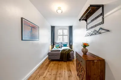 Ein Bett oder Betten in einem Zimmer der Unterkunft The Rheinsberger Mitte, 80m2, 2BR & Living Room, downtown location, Sleeps 6